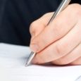 Human Hand penning a letter