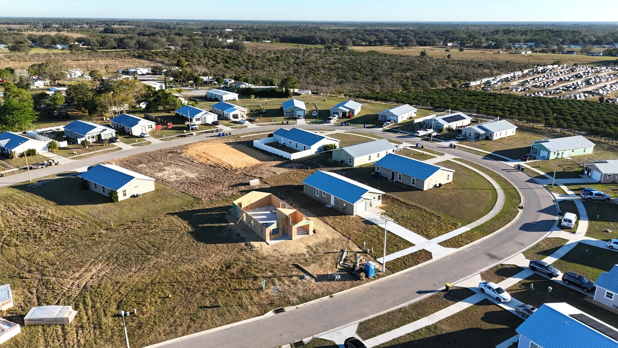 Aerial view of a Habitat home framing project on a build lot